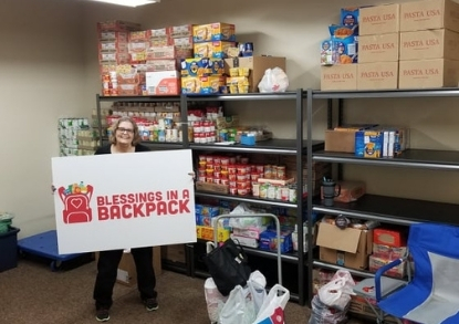 Youth Volunteer Blessings in a Backpack